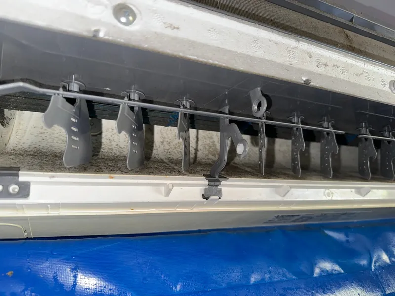 Inside of a real Townsville aircon we cleaned — mould and gunk built up on the internal parts
